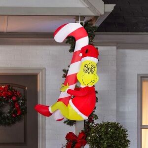 Dr. Seuss Gemmy 4.5FT Hanging Grinch on a Candy Cane Holiday Airblown Inflatable